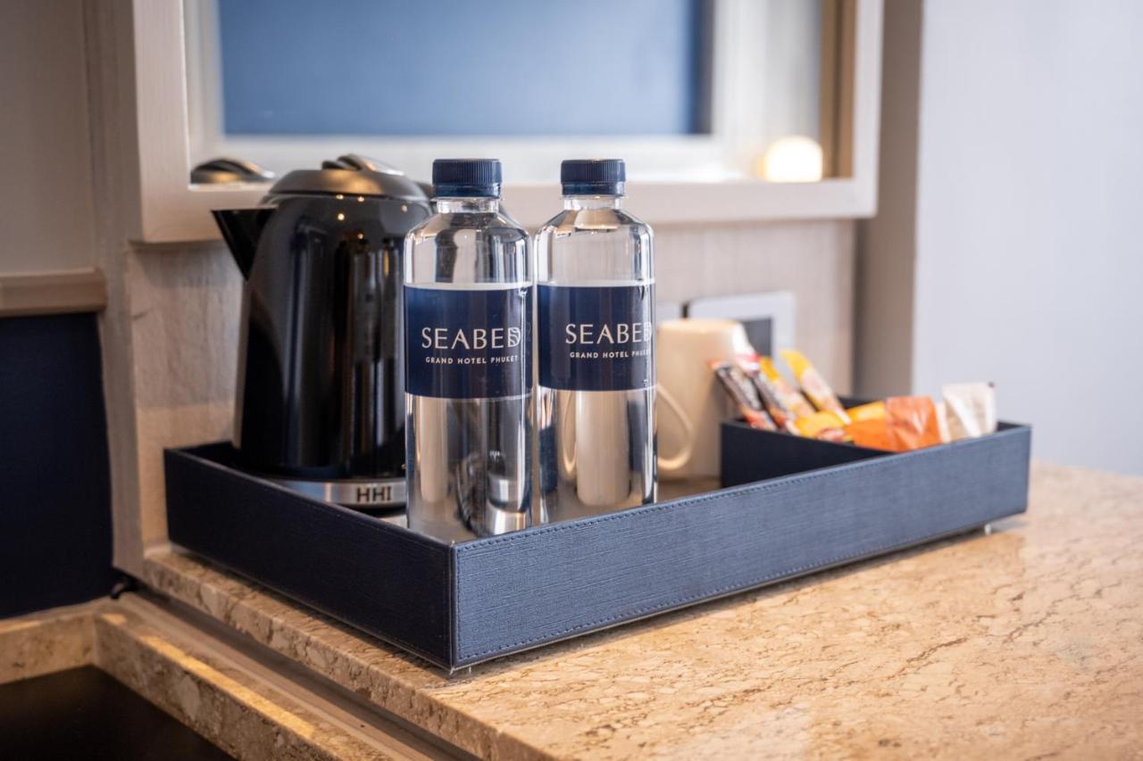 Seabed Grand Hotel Phuket - Sha Extra Plus Exterior photo SeaBear water bottles