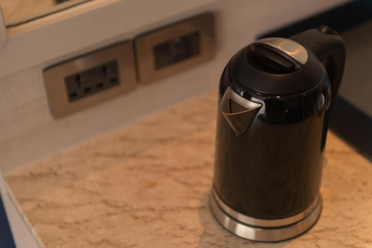 Seabed Grand Hotel Phuket - Sha Extra Plus Exterior photo A kettle