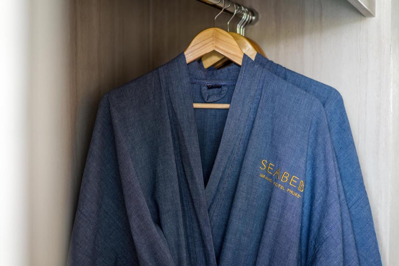 Seabed Grand Hotel Phuket - Sha Extra Plus Exterior photo A bathrobe