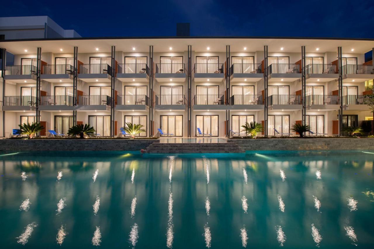 Seabed Grand Hotel Phuket - Sha Extra Plus Exterior photo The hotel at night