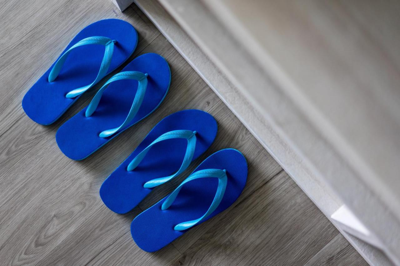 Seabed Grand Hotel Phuket - Sha Extra Plus Exterior photo Flip-flops